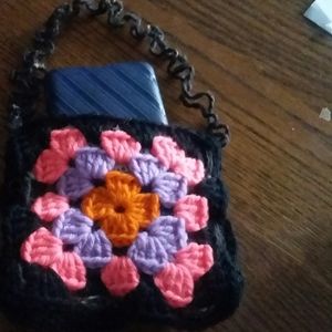 Hand crocheted over-the-shoulder pouch for pho